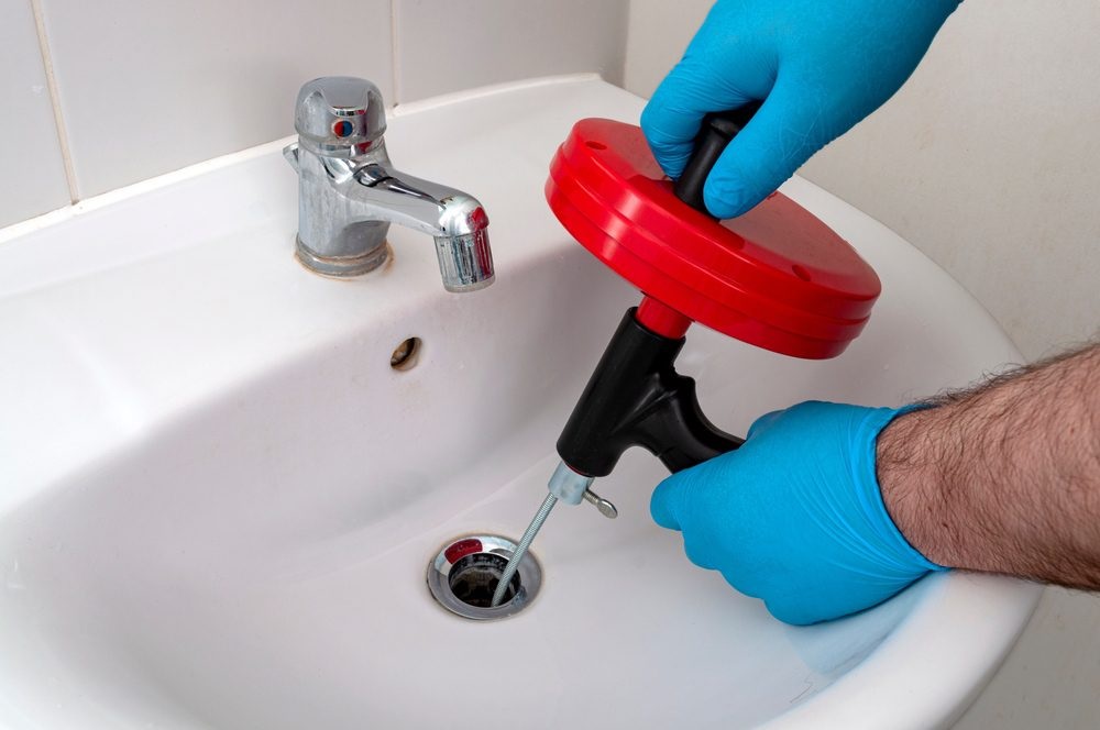 How can I prevent clogged drains in my home?