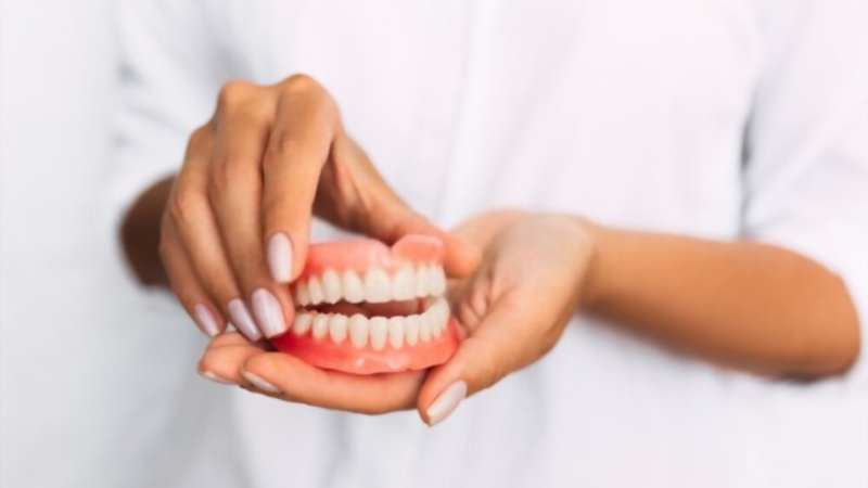 Difference Between Dentures And Dental Implants: A Quick Comparison